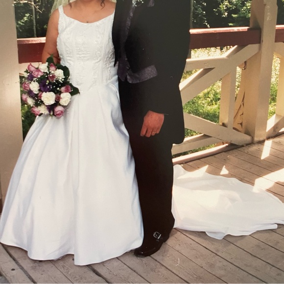 Size 18 white wedding dress. Comes with the train and petticoat. $1200 OBO - Picture 1 of 11